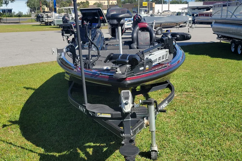 Slide: The Image of 2017 Nitro Z21 Pro boat on grass, equipped with advanced fishing gear. - 3