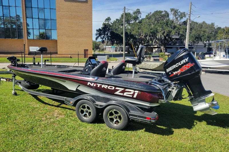 Slide: The Image of 2017 Nitro Z21 Pro bass boat with Mercury Pro XS engine on trailer. - 7