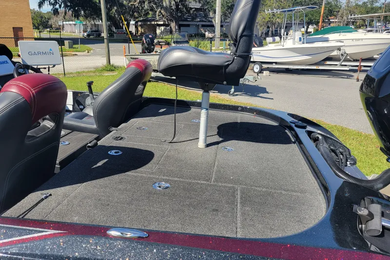 Slide: The Image of 2017 Nitro Z21 Pro boat deck with seating and storage compartments. - 8