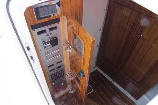 Slide: The Image of 2024 HCB 53 Suenos RXV interior with control panel and wooden cabinetry. - 23