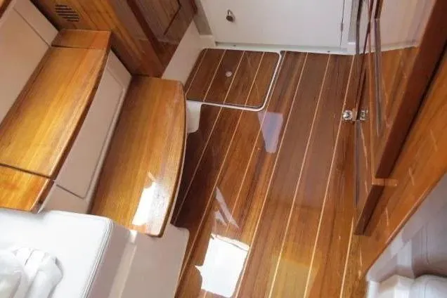 Slide: The Image of Luxurious interior of 2024 HCB 53 Suenos RXV with polished wooden flooring. - 26