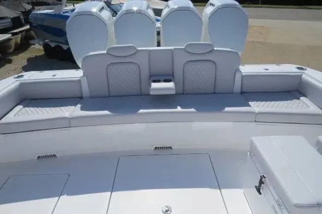 Slide: The Image of 2024 HCB 53 Suenos RXV boat with luxurious seating and powerful engines. - 3