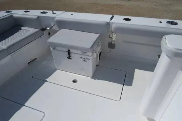 Slide: The Image of 2024 HCB 53 Suenos RXV boat deck with seating and storage. - 4