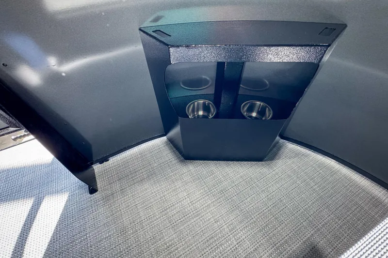 Slide: The Image of 2026 Veranda Vista 20F4 interior with dual cup holders and sleek design. - 10