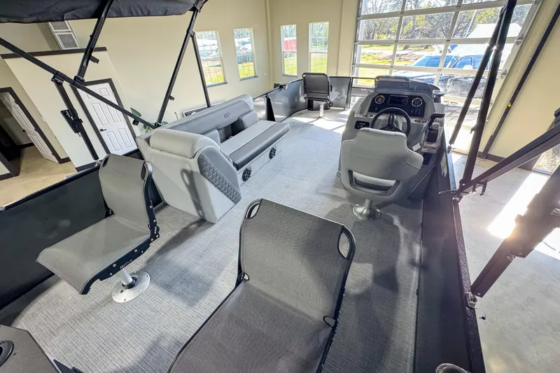 Slide: The Image of Interior of 2026 Veranda Vista 20F4 pontoon boat with modern seating and helm. - 13