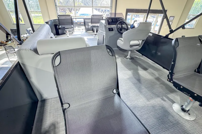 Slide: The Image of Interior of 2026 Veranda Vista 20F4 pontoon boat with modern seating and helm. - 14