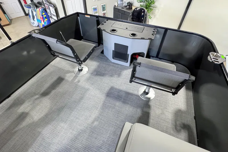Slide: The Image of Interior of 2026 Veranda Vista 20F4 pontoon boat with seating and control console. - 16