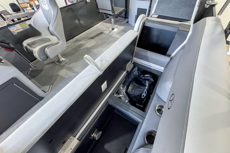 Slide: The Image of 2026 Veranda Vista 20F4 boat interior with storage compartments and seating. - 20