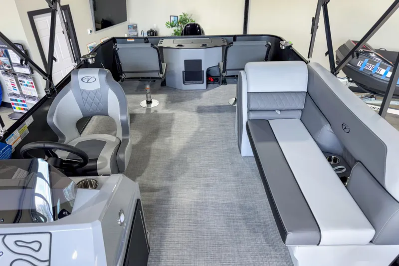 Slide: The Image of 2026 Veranda Vista 20F4 boat interior with modern seating and steering console. - 6