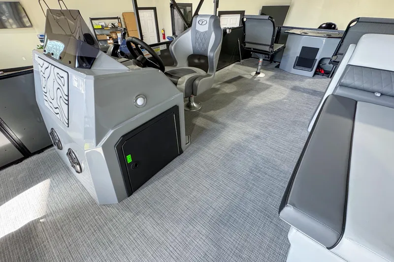 Slide: The Image of Interior of 2026 Veranda Vista 20F4 boat with modern seating and control panel. - 7