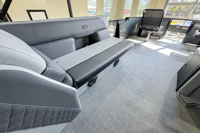 Slide: The Image of Interior of 2026 Veranda Vista 20F4 boat with modern seating and carpeted flooring. - 9