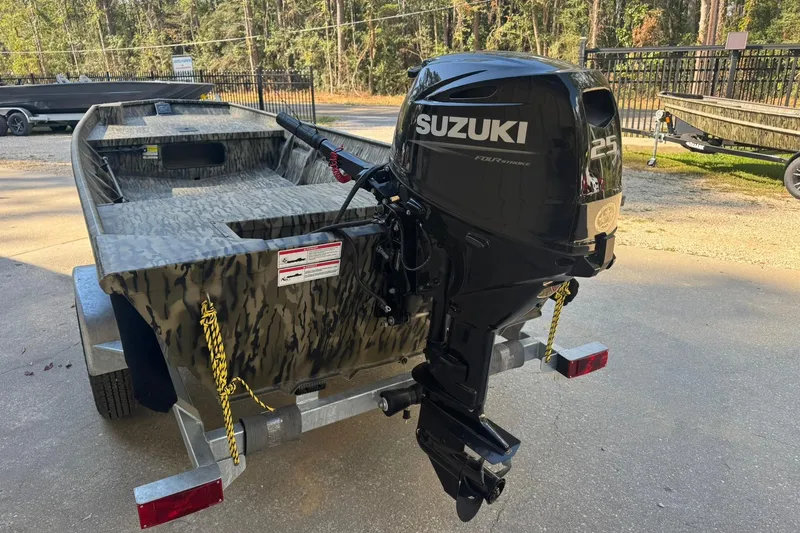 Slide: The Image of 2025 SeaArk 1648 MV Special boat with Suzuki 25 horsepower outboard motor. - 7