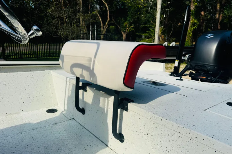 Slide: The Image of 2024 SeaArk Shadow 19 v boat interior with white and red seating. - 27