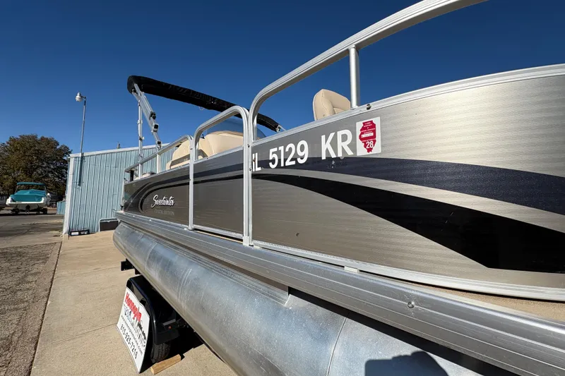 Slide: The Image of 2014 Godfrey Sweetwater 2086 F pontoon boat parked outdoors on a sunny day. - 26