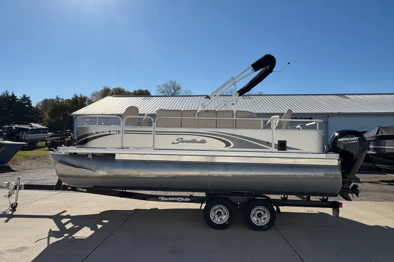 Slide: The Image of 2014 Godfrey Sweetwater 2086 F pontoon boat on trailer, parked outdoors. - 4