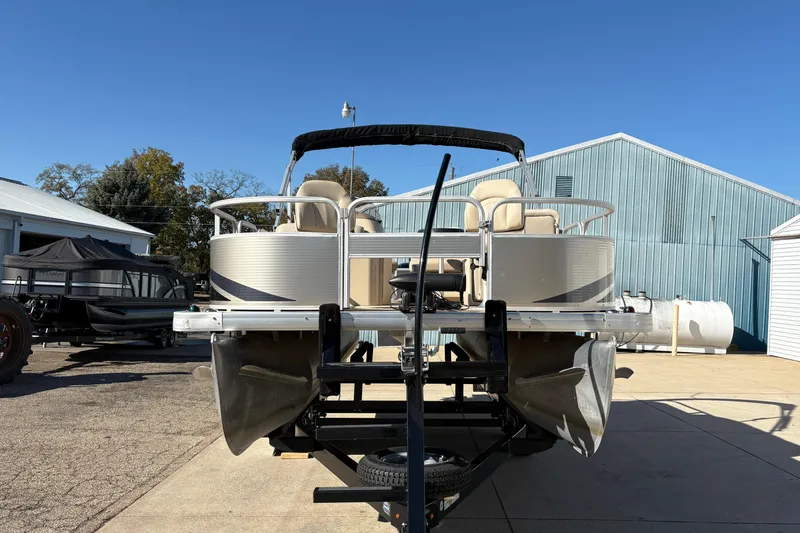 Slide: The Image of 2014 Godfrey Sweetwater 2086 F pontoon boat on trailer, parked outdoors. - 6