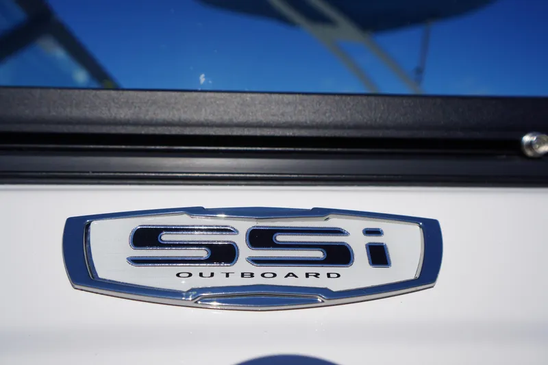 Slide: The Image of 2026 Chaparral 21 SSi OB boat emblem with "SSi Outboard" text. - 3