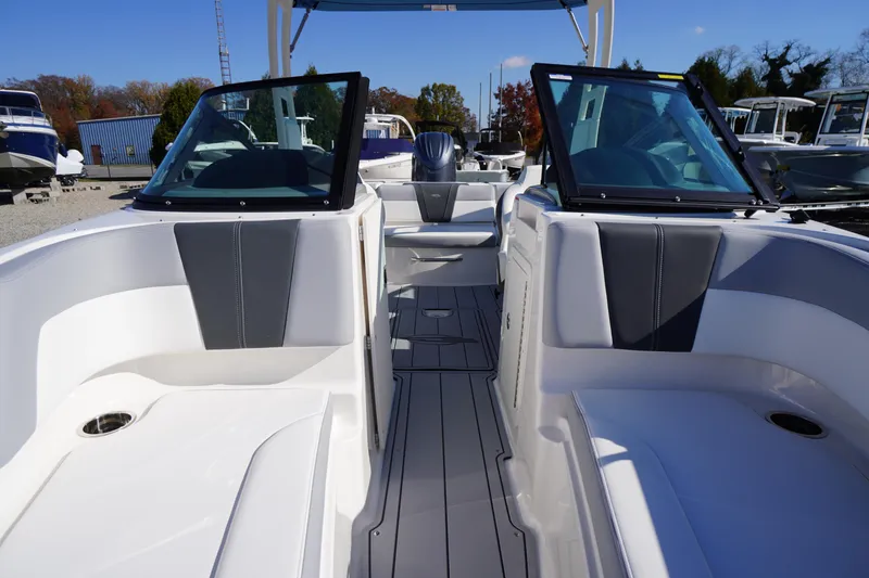 Slide: The Image of 2026 Chaparral 21 SSi OB boat interior with open cockpit and seating. - 11