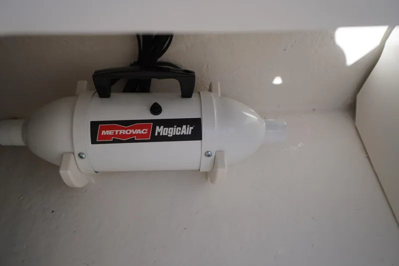 Slide: The Image of Metrovac MagicAir device inside 2026 Chaparral 21 SSi OB boat. - 40