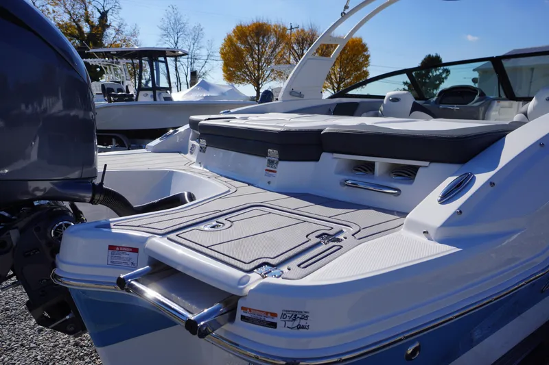 Slide: The Image of 2026 Chaparral 21 SSi OB boat with sleek design and spacious seating. - 53