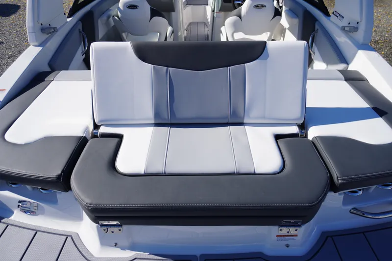 Slide: The Image of 2026 Chaparral 21 SSi OB boat interior with sleek, modern seating design. - 49