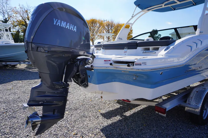 Slide: The Image of 2026 Chaparral 21 SSi OB boat with Yamaha outboard motor, displayed outdoors. - 54