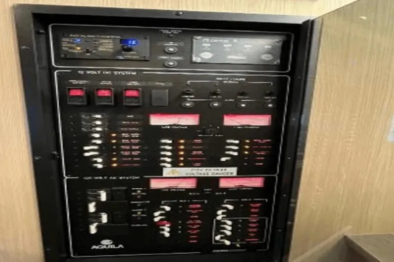 Slide: The Image of Electrical control panel of 2022 Aquila 36 Cruiser boat. - 9