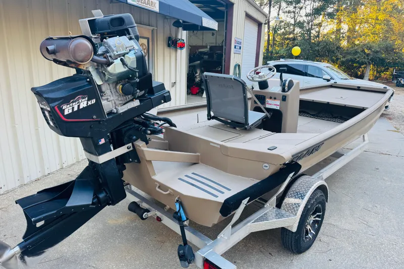 Slide: The Image of 2025 SeaArk Mud Runner 180 boat on trailer with powerful Gator Tail motor. - 14