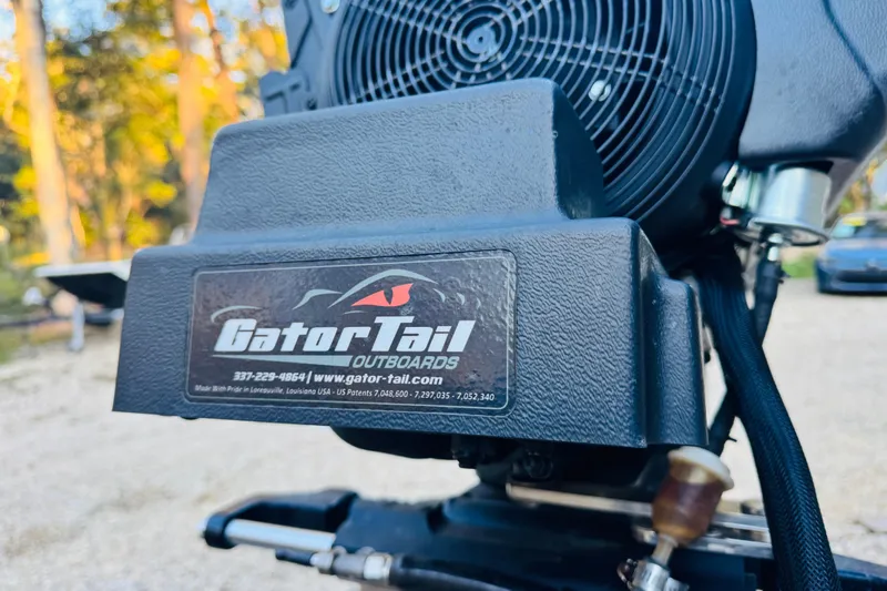 Slide: The Image of Gator Tail outboard motor on 2025 SeaArk Mud Runner 180 boat, close-up view. - 20