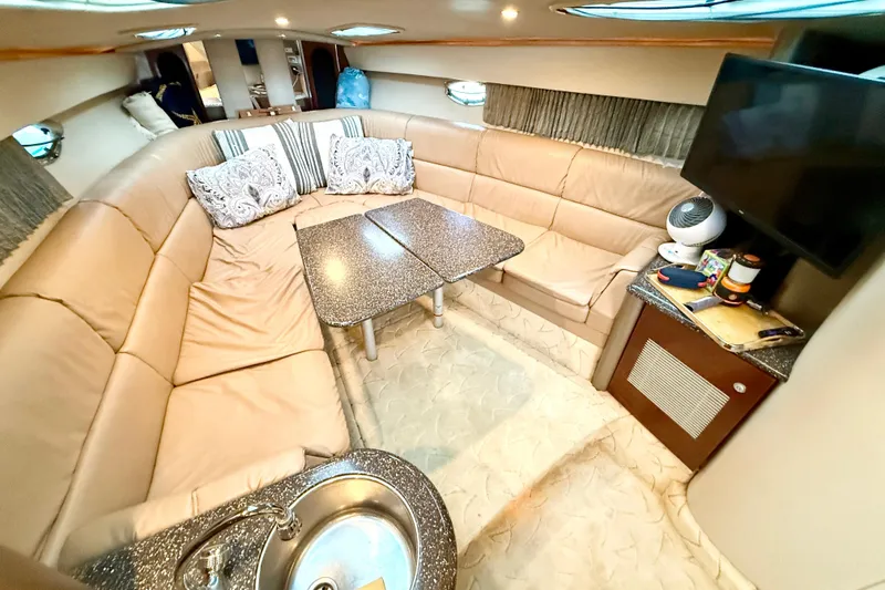 Slide: The Image of Luxurious interior of a 2004 Formula 400 Super Sport yacht with plush seating and modern amenities. - 16