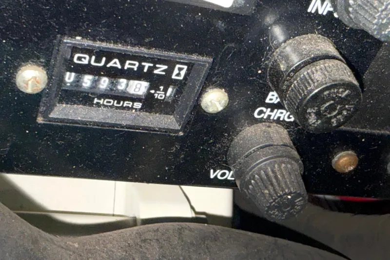 Slide: The Image of Close-up of a 2004 Formula 400 Super Sport hour meter and control knobs. - 29