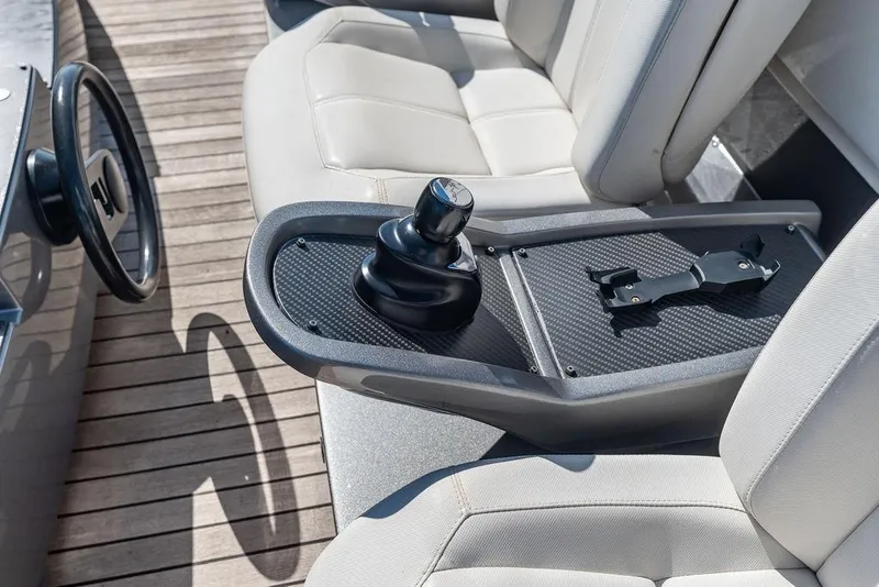 Slide: The Image of 2019 Pershing 9X yacht interior with steering wheel and control panel. - 20