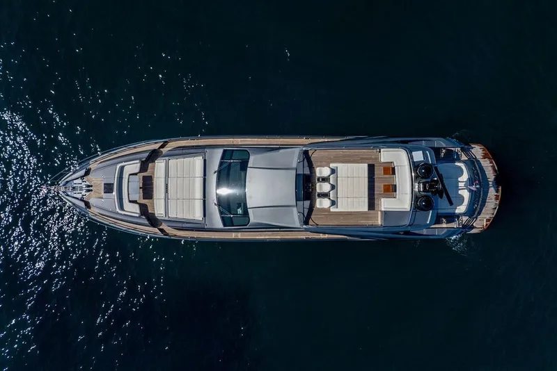 Slide: The Image of Aerial view of 2019 Pershing 9X luxury yacht on dark water. - 28
