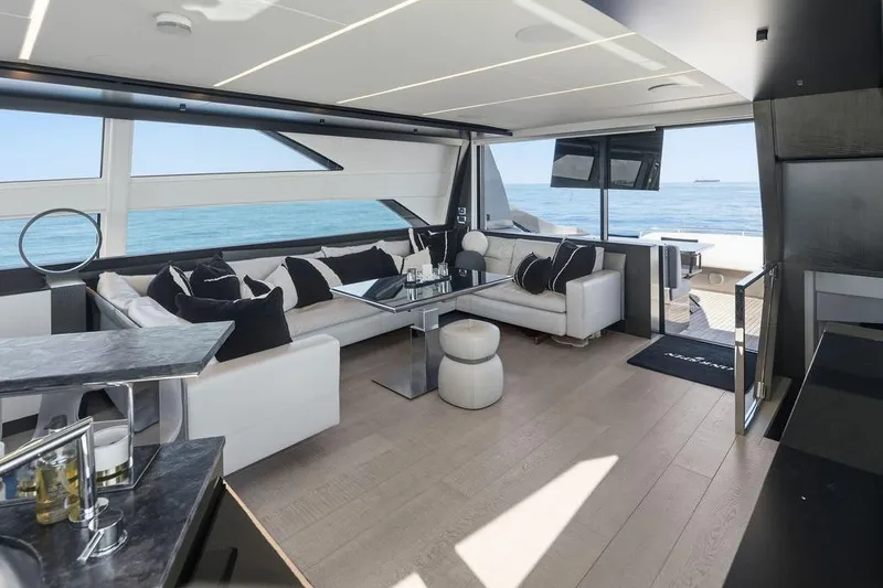 Slide: The Image of Luxurious interior of 2019 Pershing 9X yacht with modern furnishings and ocean view. - 51