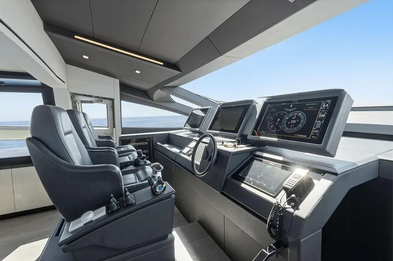 Slide: The Image of Interior of 2019 Pershing 9X yacht cockpit with modern navigation systems. - 55