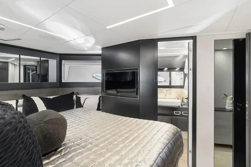 Slide: The Image of Luxurious interior of 2019 Pershing 9X yacht bedroom with modern design and elegant furnishings. - 61