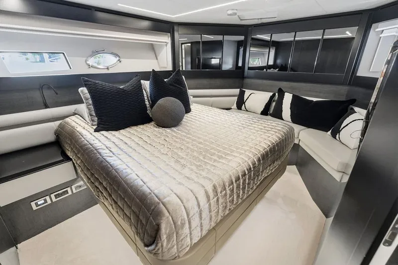 Slide: The Image of Luxurious interior of 2019 Pershing 9X yacht with elegant bedding and modern design. - 62