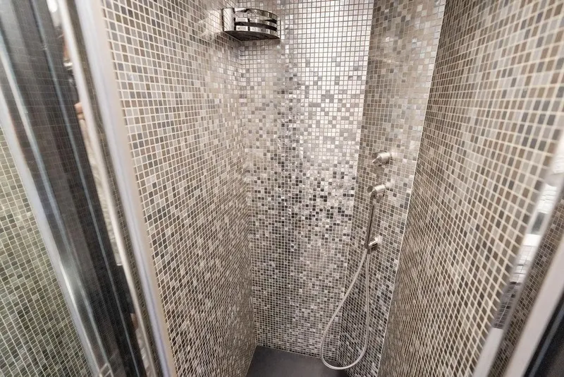 Slide: The Image of Luxurious mosaic-tiled shower in 2019 Pershing 9X yacht bathroom. - 68