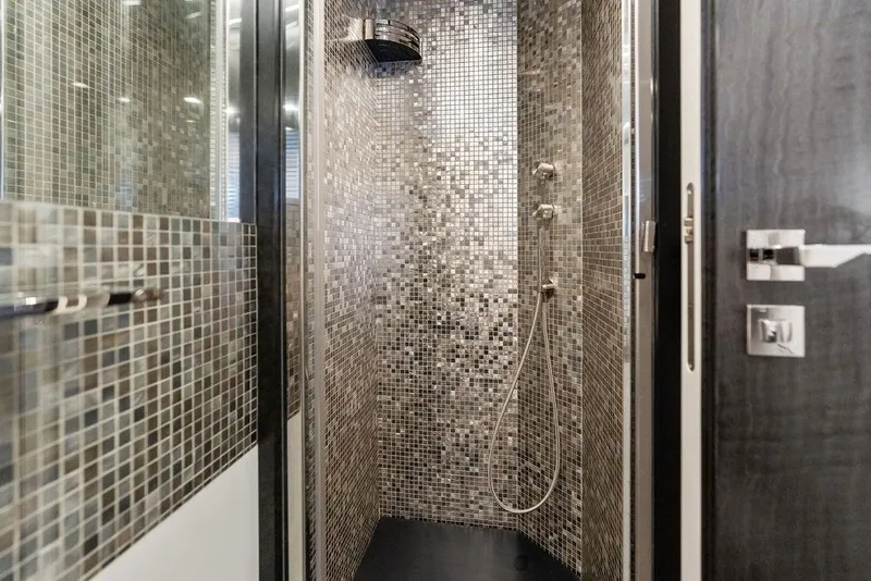 Slide: The Image of Luxurious mosaic-tiled shower in 2019 Pershing 9X yacht bathroom. - 69
