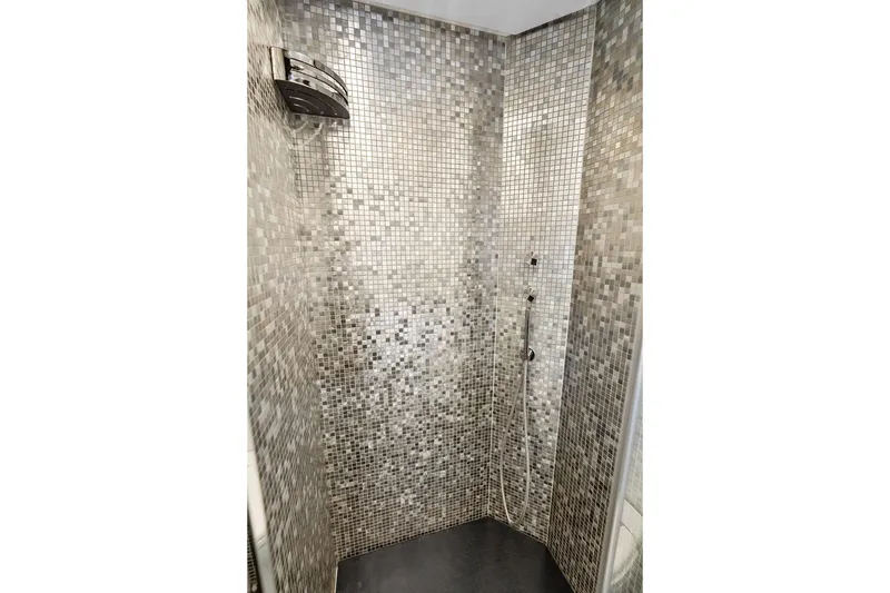 Slide: The Image of Luxurious mosaic-tiled shower in 2019 Pershing 9X yacht bathroom. - 75