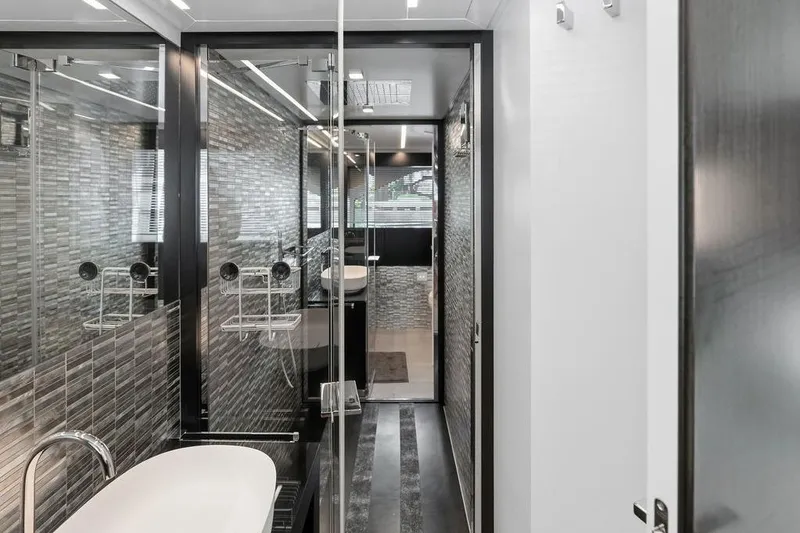 Slide: The Image of Luxurious bathroom interior of 2019 Pershing 9X yacht with modern design elements. - 76