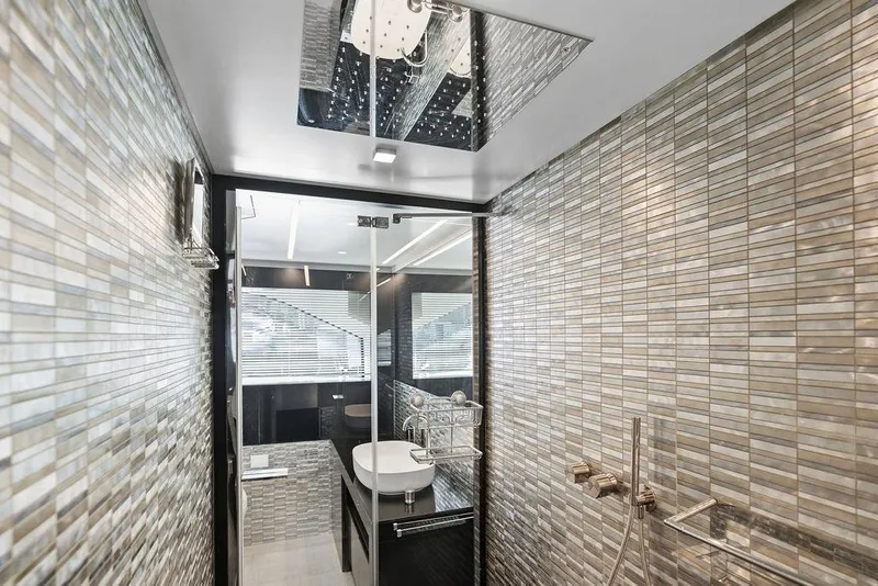 Slide: The Image of Luxurious bathroom interior on 2019 Pershing 9X yacht with modern tile design. - 78