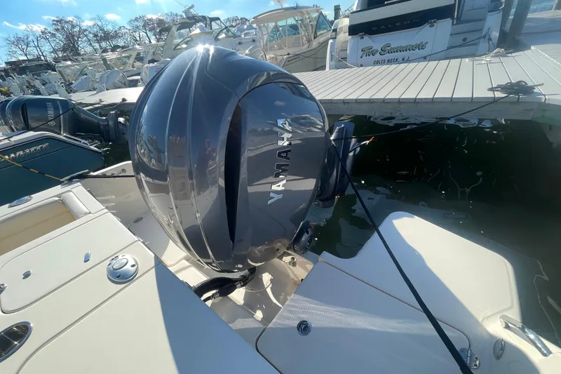Slide: The Image of 2023 Grady-White Fisherman 236 with Yamaha outboard engine at dock. - 50