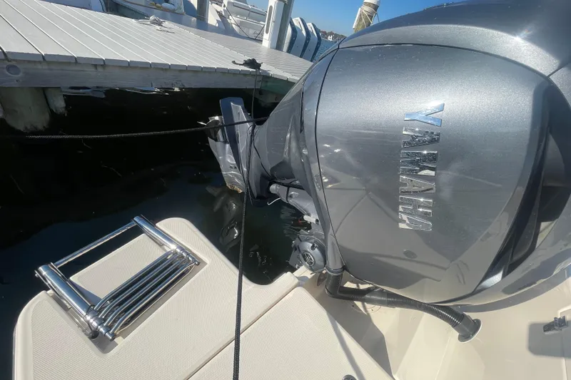 Slide: The Image of 2023 Grady-White Fisherman 236 with Yamaha outboard motor at dock. - 51