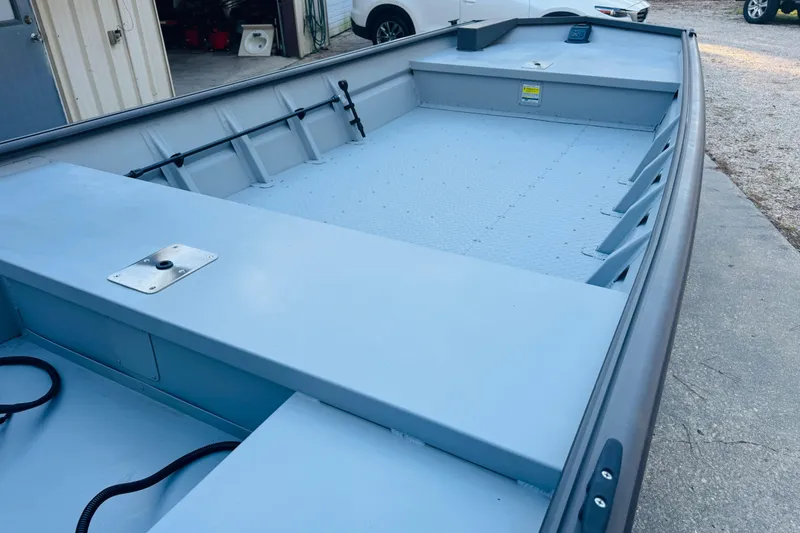 Slide: The Image of 2025 SeaArk 1660 MVT boat with spacious interior and durable construction. - 10