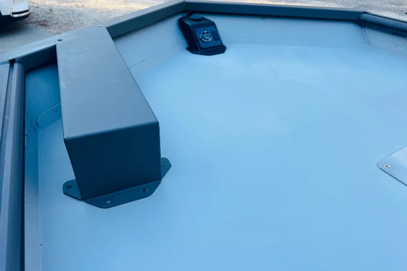 Slide: The Image of 2025 SeaArk 1660 MVT boat interior, showcasing a sleek, durable design. - 11