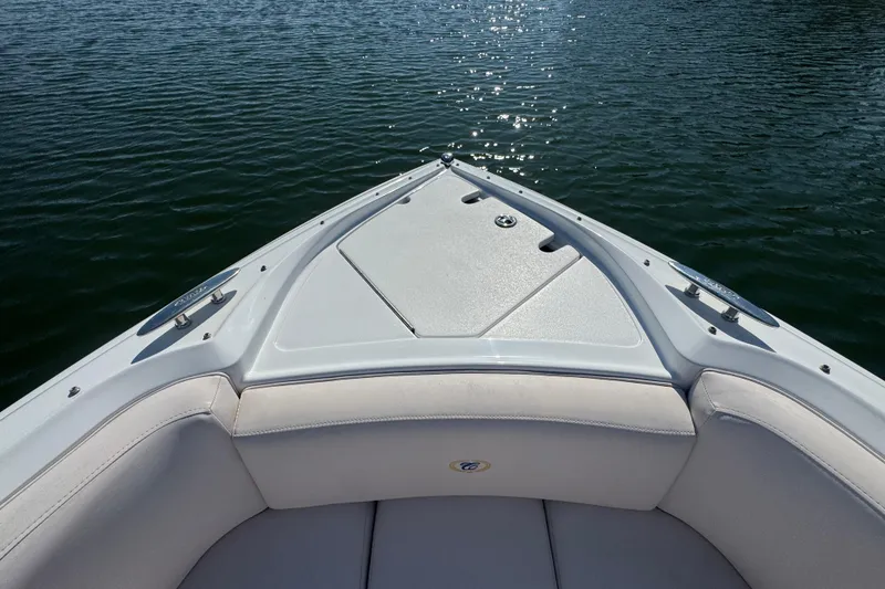 Slide: The Image of Bow of a 2006 Cobalt 272 boat on calm water. - 13