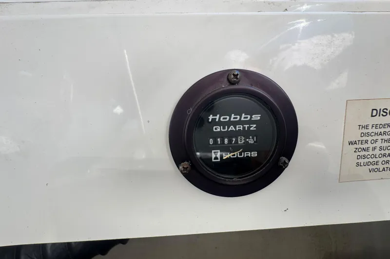 Slide: The Image of Hobbs Quartz hour meter on 2006 Cobalt 272 boat, displaying 1878 hours. - 28