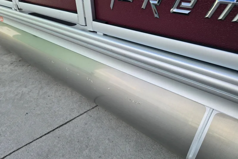 Slide: The Image of Close-up of 2017 Premier 220 SunSation boat seat with gray and maroon upholstery. - 13