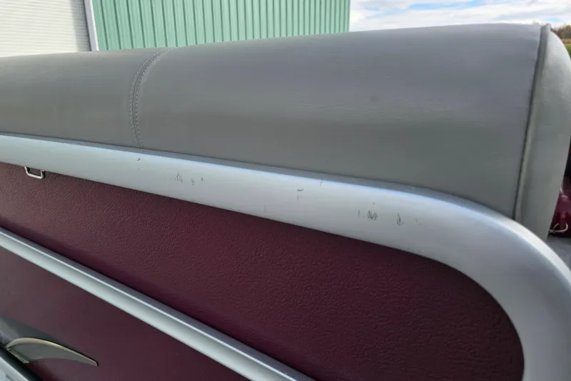 Slide: The Image of 2017 Premier 220 SunSation boat detail with cup holders and cleat. - 14